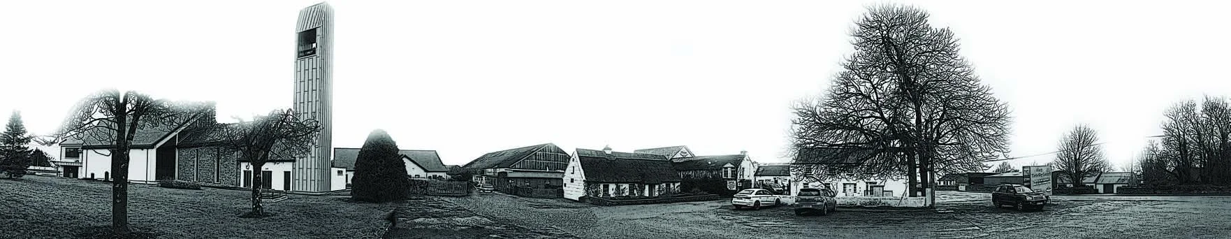 A panoramic view of Lackagh: the church and bell tower on the left, with the thatched museum cottage beside them.